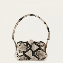 Roha Torebka, Zlamana Biel Pytona