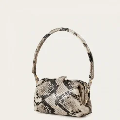 Roha Torebka, Zlamana Biel Pytona